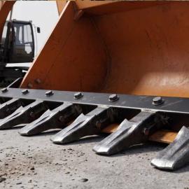 Bucket Teeth vs. Bucket Tooth Bar Procurement Guide
